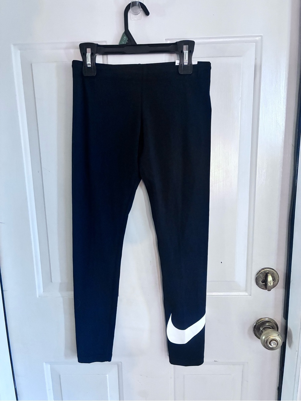 Nike Kids Black Leggings with White Swoosh Accent